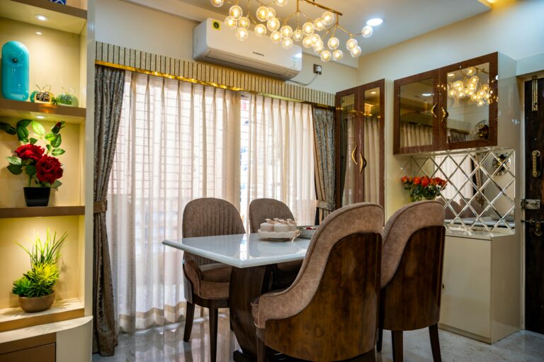 Stylish dining area featuring chic decor, contemporary lighting, and a cozy ambiance.